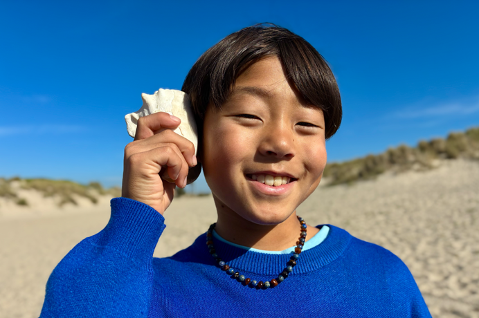 Zdjęcie wykonane aparatem Fusion 48 MP, zaprezentowana funkcja udoskonalonych portretów, w kadrze twarz osoby