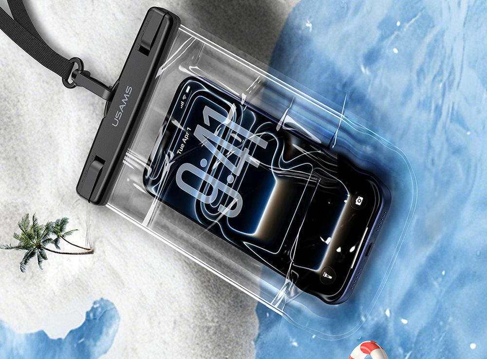 Etui USAMS YD016 smycz odczepiana uniwersalne duża pojemność telefon Wodoodporne etui na telefon z czarną smyczą i blokadą, prezentowane na tle plaży i błękitnej wody morskiej.