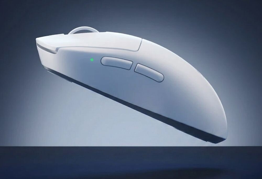 MCHOSE A7 V2 Ultra Częstotliwość raportowania do 8000 Hz myszą a komputerem wysokiemu polling rate dynamicznych gier FPS (First-Person Shooter) Wysoka częstotliwość raportowania - biała myszka lewitująca nad powierzchnią