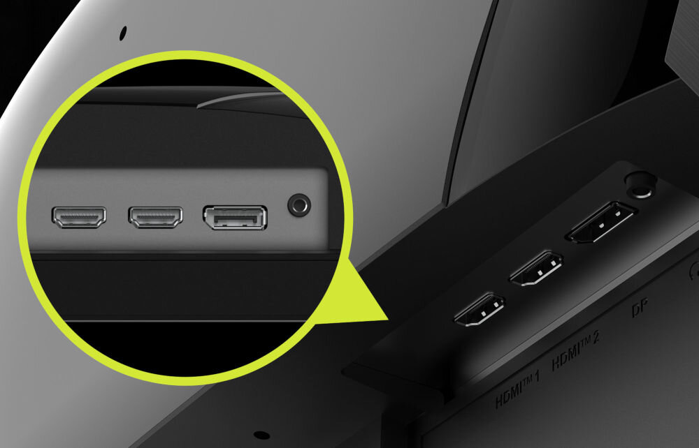 Obraz przedstawia zbliżenie na porty monitora, w tym dwa porty HDMI i jeden DisplayPort. Obok portów widoczny jest okrągły port audio.