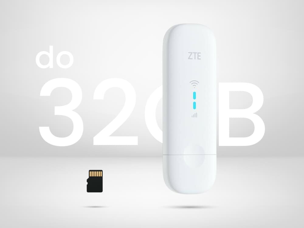 Modem ZTE MF79N 4G LTE Biały modem USB ZTE na jasnym tle z napisem „Do 32 GB” i widoczną kartą microSD. Obraz odnosi się do funkcji lokalnego magazynowania danych dzięki slotowi na kartę pamięci, slot na kartę pamięci