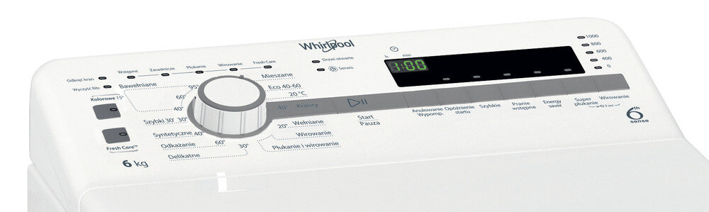Panel sterowania pralki z widocznym logo Whirlpool, pokrętłem wyboru programów oraz wyświetlaczem cyfrowym pokazującym \'1:00\'. Widoczne są różne opcje prania, takie jak \'Bawełniane\', \'Syntetyczne\' i \'Delikatne\'.