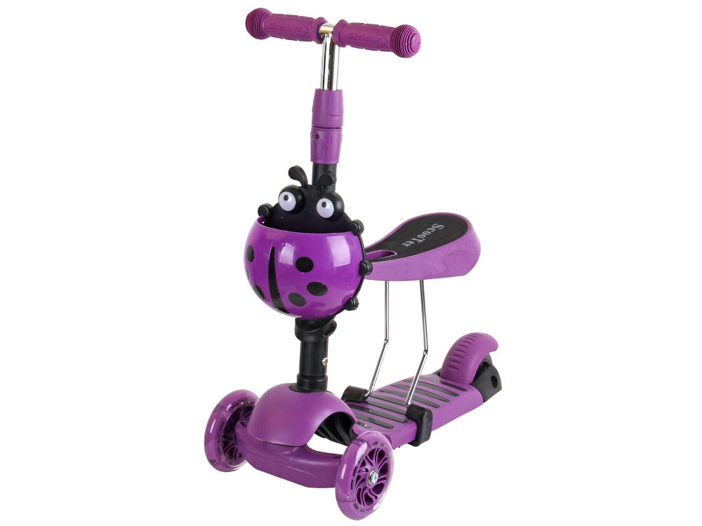 Fioletowa hulajnoga dla dzieci z motywem biedronki na przodzie. Na podnóżku widoczny jest napis \'SCOOTER\'.