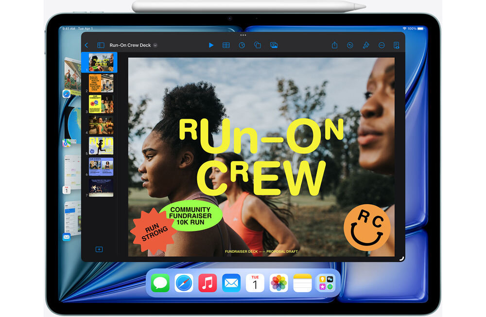 Tablet z wyświetlaczem pokazującym aplikację z napisem \'Run-On Crew\' oraz zdjęciem dwóch osób. Na ekranie widoczne są także ikony aplikacji na dolnym pasku.