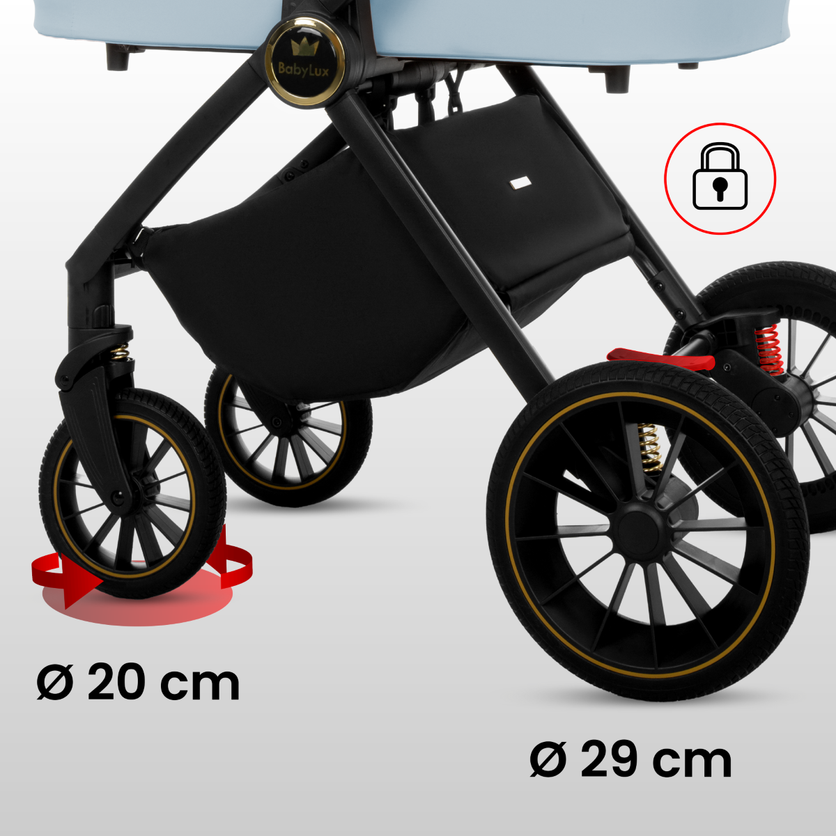 Obraz przedstawia dolną część wózka dziecięcego z widocznymi kołami o średnicach 20 cm i 29 cm. Na wózku znajduje się logo \'BabyLux\' oraz ikona kłódki.