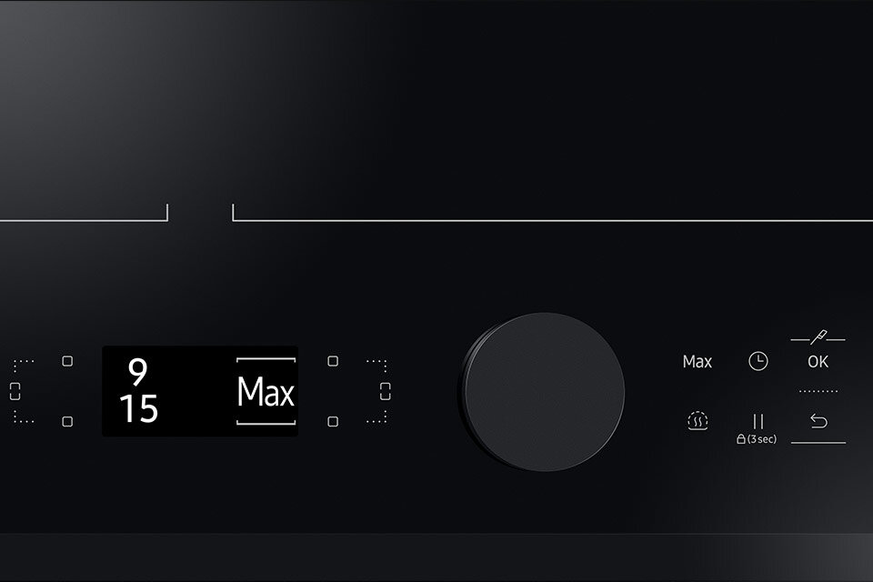 Czarna płyta indukcyjna z wyświetlaczem pokazującym \'9 15\' i \'Max\'. Obok znajduje się duże pokrętło oraz symbole funkcji, w tym \'Max\', \'OK\', i ikony czasowe.