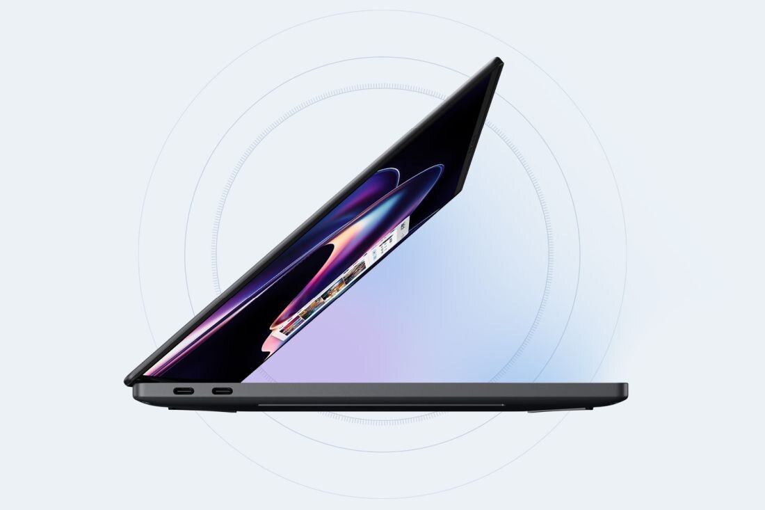 Laptop Dell XPS 14 z Wi‑Fi prezentuje smukły profil i porty USB-C na jasnym tle podczas mobilnej pracy biznesowej