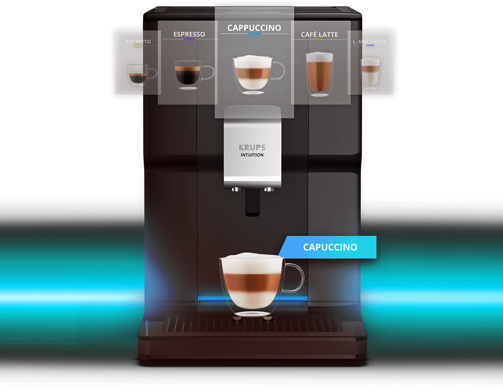 Ekspres do kawy z widocznymi opcjami napojów: Ristretto, Espresso, Cappuccino, Café Latte, L. Macchiato. Na ekspresie widnieje napis \'KRUPS Intuition\', a poniżej znajduje się filiżanka cappuccino z etykietą \'CAPPUCCINO\'.
