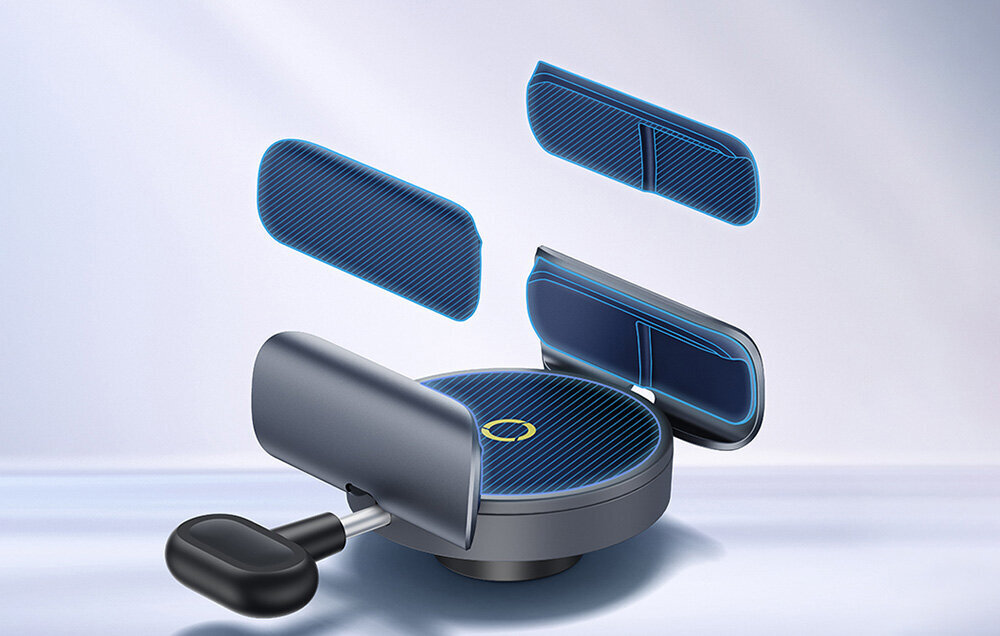 Obraz przedstawia magnetyczny uchwyt na telefon w kolorze szaro-czarnym z elementami niebieskimi. W tle widoczne są cztery niebieskie, prostokątne elementy z teksturą, unoszące się wokół uchwytu.