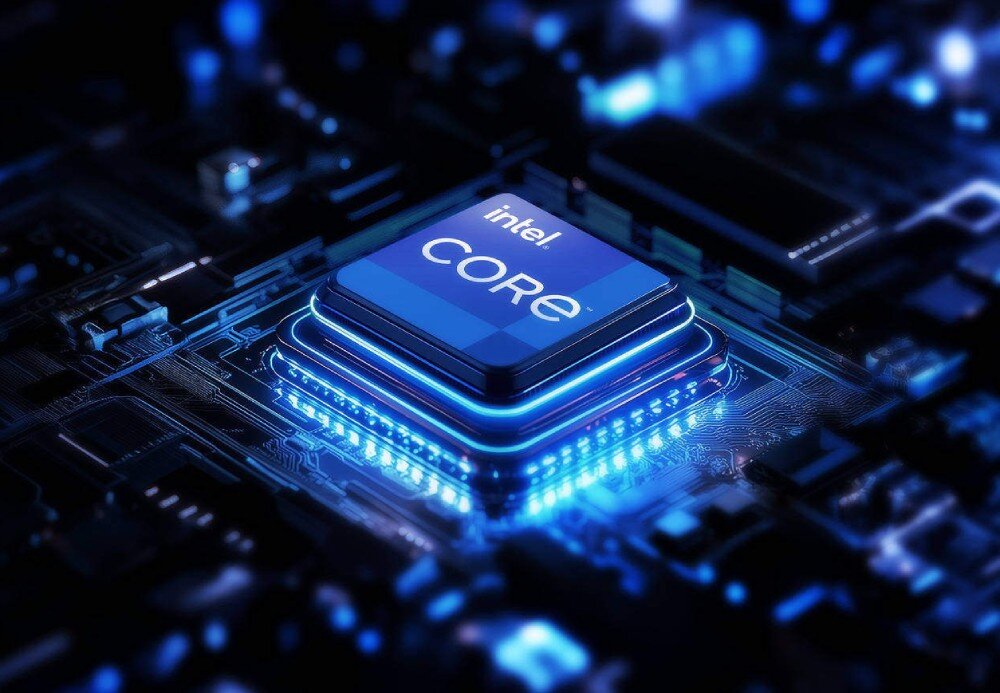 Komputer All in One ACER Aspire C27A-GRPL Zbliżenie na procesor komputerowy z logo 'intel CORE' umieszczony na płycie głównej z podświetlonymi na niebiesko ścieżkami elektrycznymi