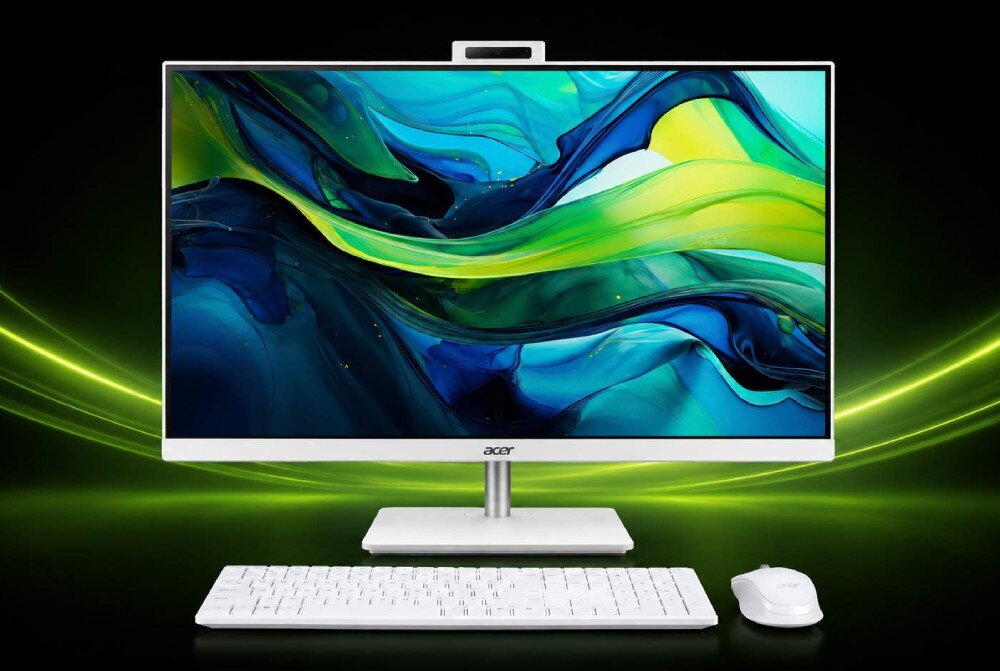 Komputer All in One ACER Aspire C27A-GRPL Komputer typu all-in-one widziany od przodu, przed którym leżą bezprzewodowa klawiatura oraz mysz komputerowa na ciemnym tle z liniami światła