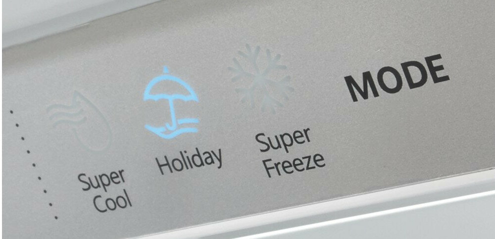 Panel sterowania z trzema ikonami i napisami: Super Cool, Holiday, Super Freeze oraz tekstem MODE. Ikony przedstawiają falę, parasol i płatek śniegu.