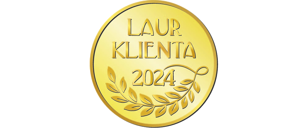 Złoty medal z napisem \'LAUR KLIENTA 2024\' oraz dekoracyjnym motywem liściastym.