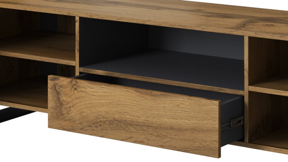 Szafka RTV wykonana z drewna w kolorze dąb wotan z antracytowymi elementami, posiada otwarte półki i wysuwaną szufladę.