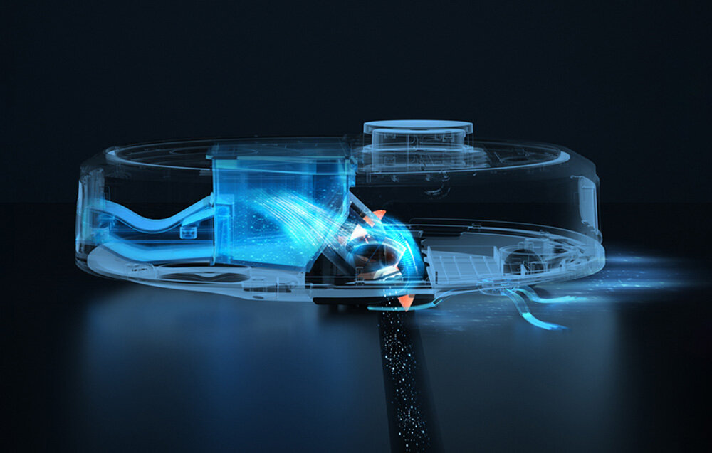 Obraz przedstawia przezroczysty model robota sprzątającego, ukazujący jego wewnętrzne mechanizmy i przepływ powietrza. W tle widoczny jest ciemny, jednolity kolor.