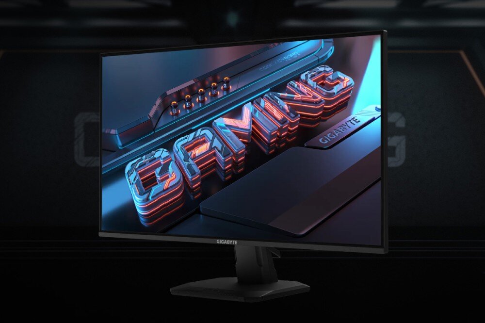 Monitor GIGABYTE GS25F2 Widok monitora pod kątem prezentujący ekran z trójwymiarowym, neonowym napisem 'GAMING' na ciemnym tle, matryca, rozdzielczość, przekątna