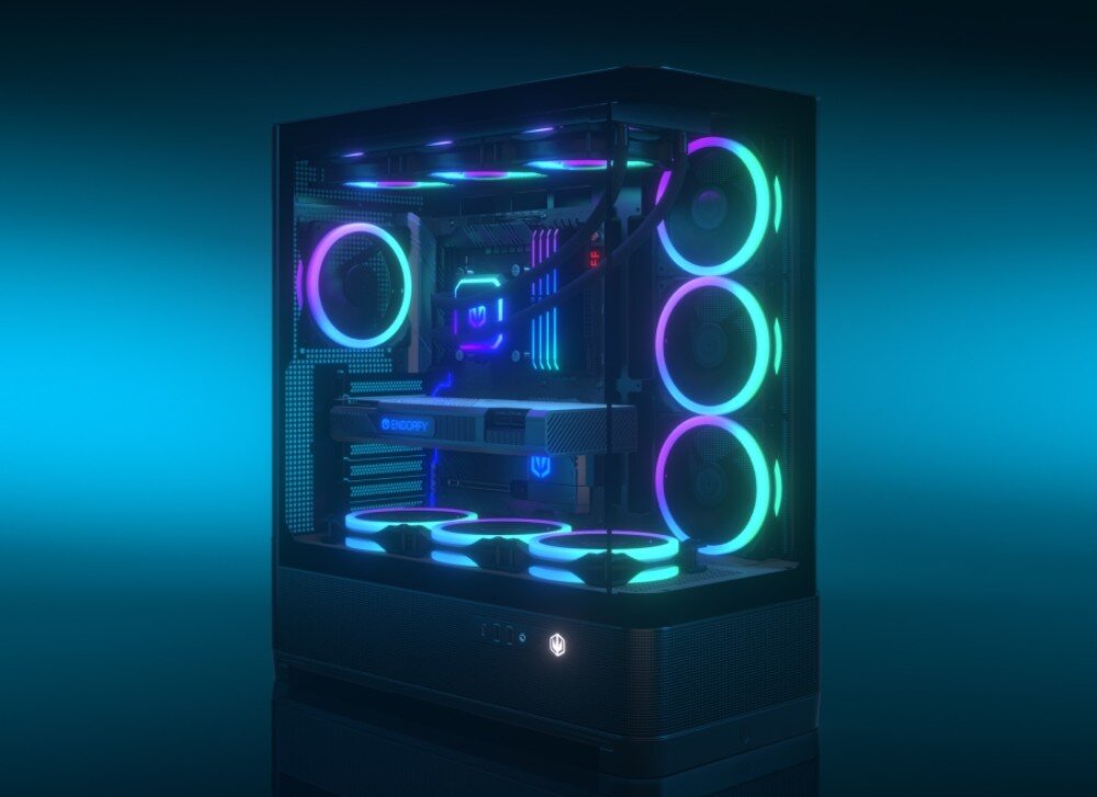 Obudowa ENDORFY Aquarius 8000 Flex Czarna obudowa komputera z przeszklonym panelami bocznymi i frontem, wewnątrz której świecą wielobarwne wentylatory RGB podzespołów na niebieskim tle