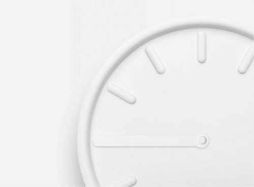 Obraz przedstawia biały, minimalistyczny zegar z zaznaczonymi godzinami w formie prostych kresek. Tło jest jednolite i jasne.