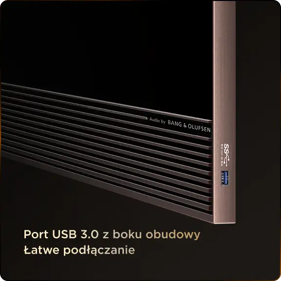 Fragment telewizora z widocznym portem USB 3.0 oraz napisem \'Audio by BANG & OLUFSEN\'. Tekst na obrazie: \'Port USB 3.0 z boku obudowy Łatwe podłączanie\'.