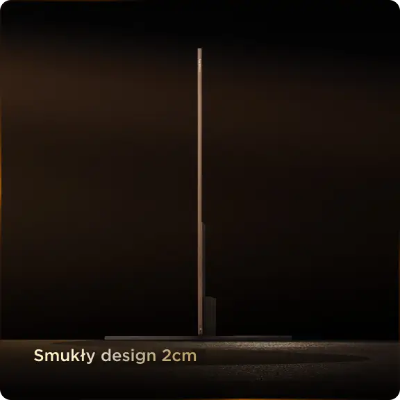 Obraz przedstawia telewizor o smukłym profilu, z napisem \'Smukły design 2cm\' na dole. Tło jest ciemne, co podkreśla cienkość urządzenia.