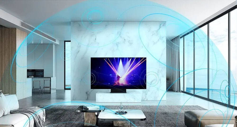 Telewizor TCL 55T69C - telewizor stojący na postumencie w pomieszczeniu