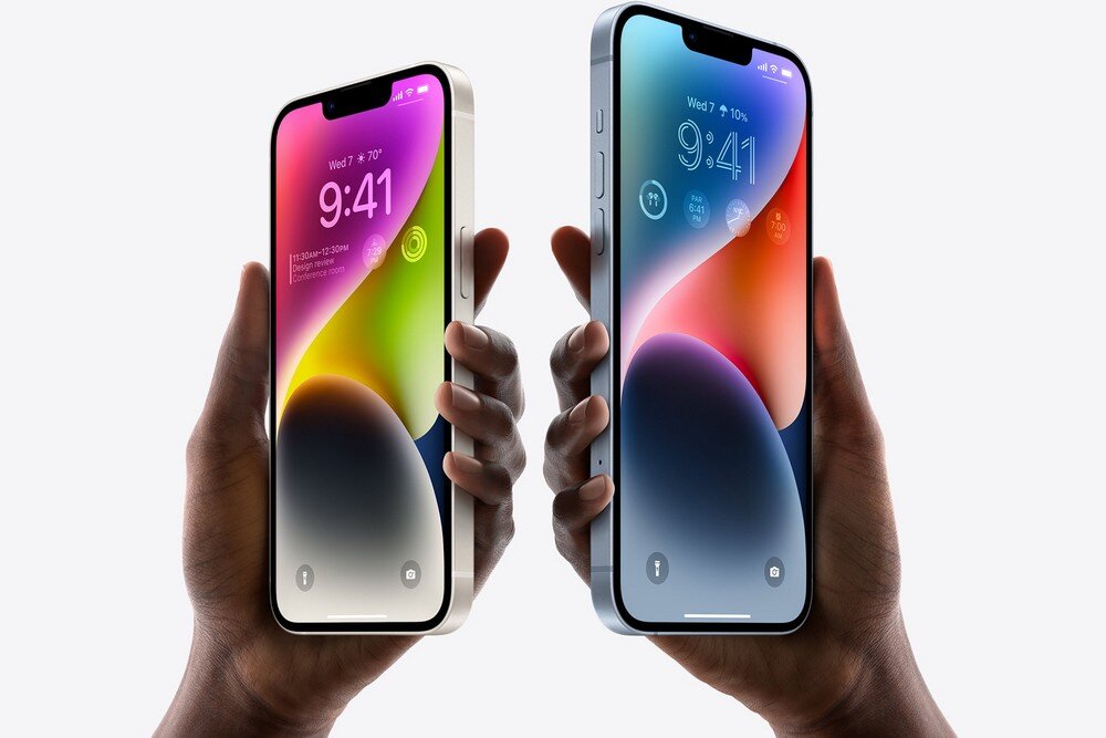 Dwa smartfony trzymane w dłoniach, z wyświetlonymi kolorowymi tapetami i godziną 9:41. Na ekranach widoczny jest tekst: \'Wed 7 * 10%\'.