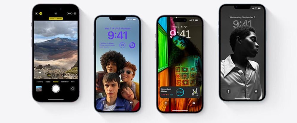 Cztery smartfony z różnymi ekranami: pierwszy pokazuje aplikację aparatu z widokiem na krajobraz, drugi ekran blokady z godziną 9:41 i zdjęciem trzech osób, trzeci ekran z kolorowym tłem i godziną 9:41, czwarty ekran z czarno-białym zdjęciem osoby i godziną 9:41.