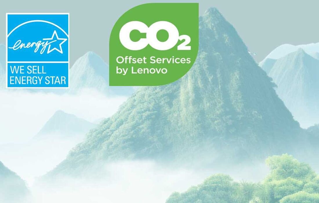 Obraz przedstawia górski krajobraz z logo \'Energy Star\' z napisem \'WE SELL ENERGY STAR\' oraz zielonym logo \'CO2 Offset Services by Lenovo\'.