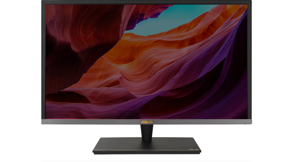 Monitor z wyświetlaczem przedstawiającym kolorowy krajobraz skalny. Na dolnej ramce widoczne jest logo ASUS.