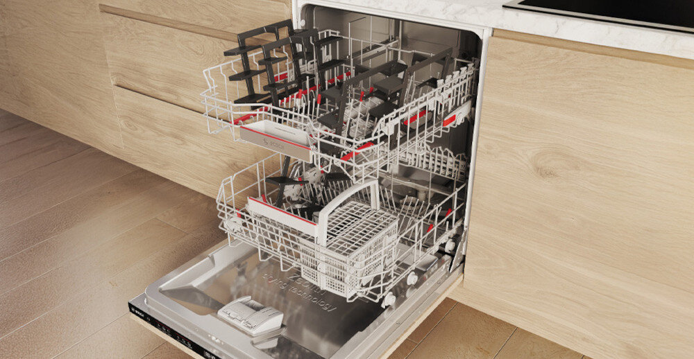 PŁYTA BOSCH PNH6B6K40 Na zdjęciu widać otwartą, zintegrowaną ze zabudową zmywarkę Bosch z wysuniętymi trzema koszami. Wnętrze jest wypełnione elementami rusztów od płyty gazowej oraz innymi naczyniami, przygotowanymi do mycia łatwe czyszczenie rusztów mycie w zmywarce powłoka ochronna odporne na korozję trwałe ruszty pielęgnacja oszczędność czasu wygląd