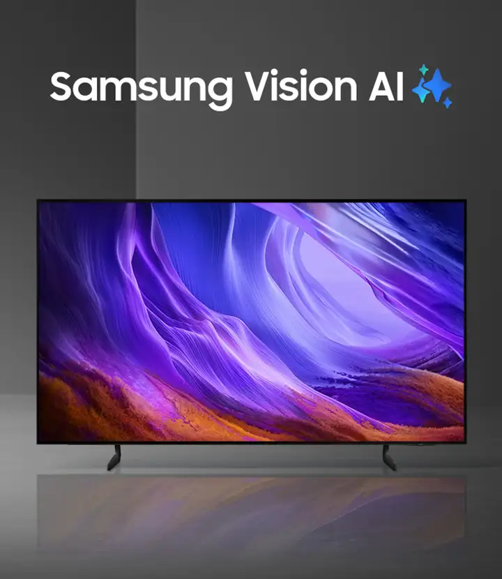 Telewizor z wyświetlaczem OLED prezentuje kolorowy, abstrakcyjny obraz w odcieniach fioletu i pomarańczu. Nad ekranem widoczny jest napis \'Samsung Vision AI\'.