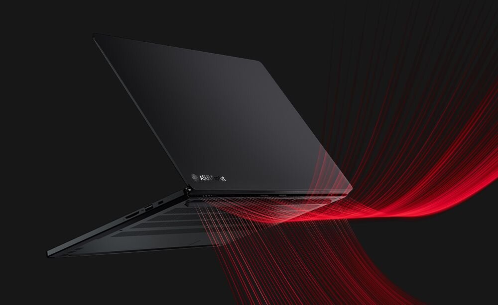 Obraz przedstawia otwarty laptop z ciemną obudową, na której widoczne jest logo ASUS. W tle widać czerwone, dynamiczne linie na czarnym tle.