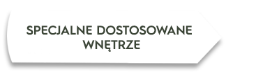 Obraz przedstawia biały prostokąt z czarnym tekstem: \'SPECJALNE DOSTOSOWANE WNĘTRZE\'.