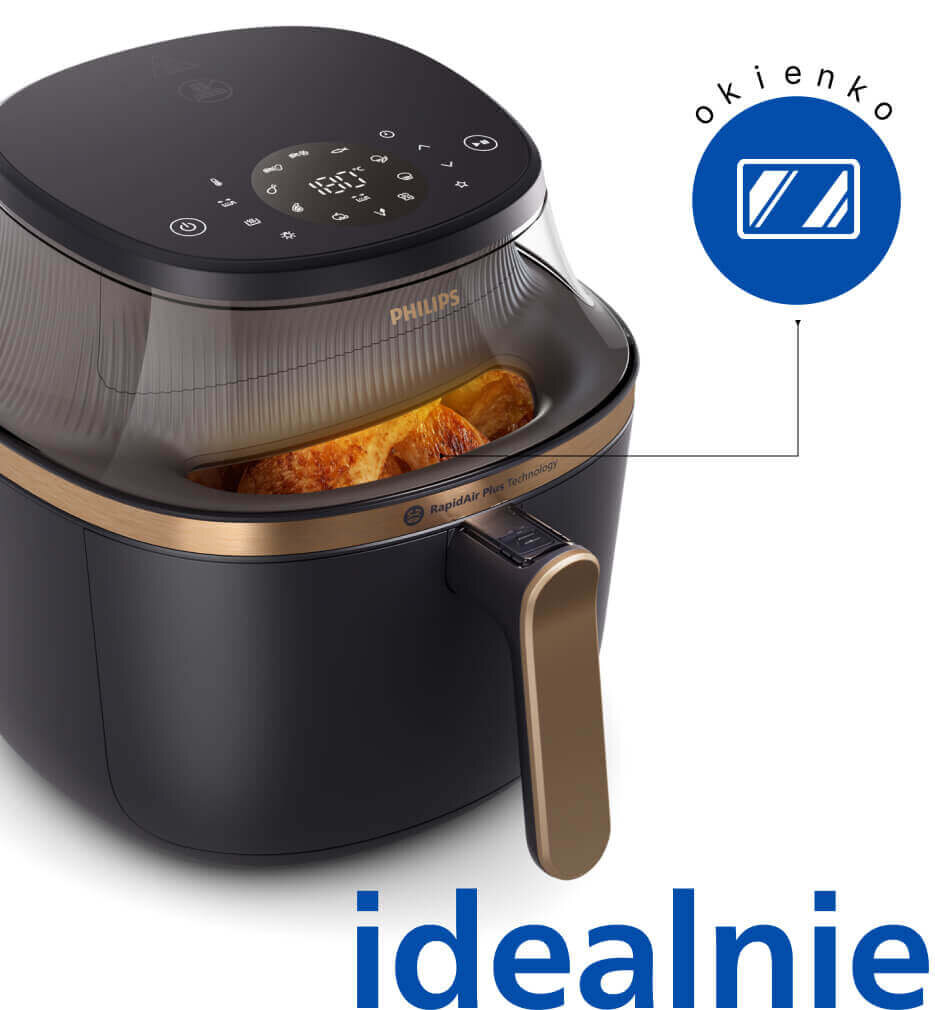 Na obrazie widoczna jest beztłuszczowa frytkownica z logo PHILIPS, z przezroczystym okienkiem pokazującym pieczone jedzenie. Obok znajduje się niebieska ikona z napisem \'okienko\' oraz duży napis \'idealnie\'.