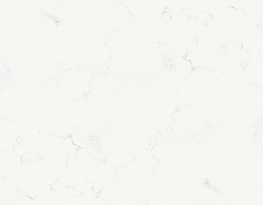 Obraz przedstawia jasną powierzchnię z delikatnymi, szarymi żyłkami przypominającymi marmur.