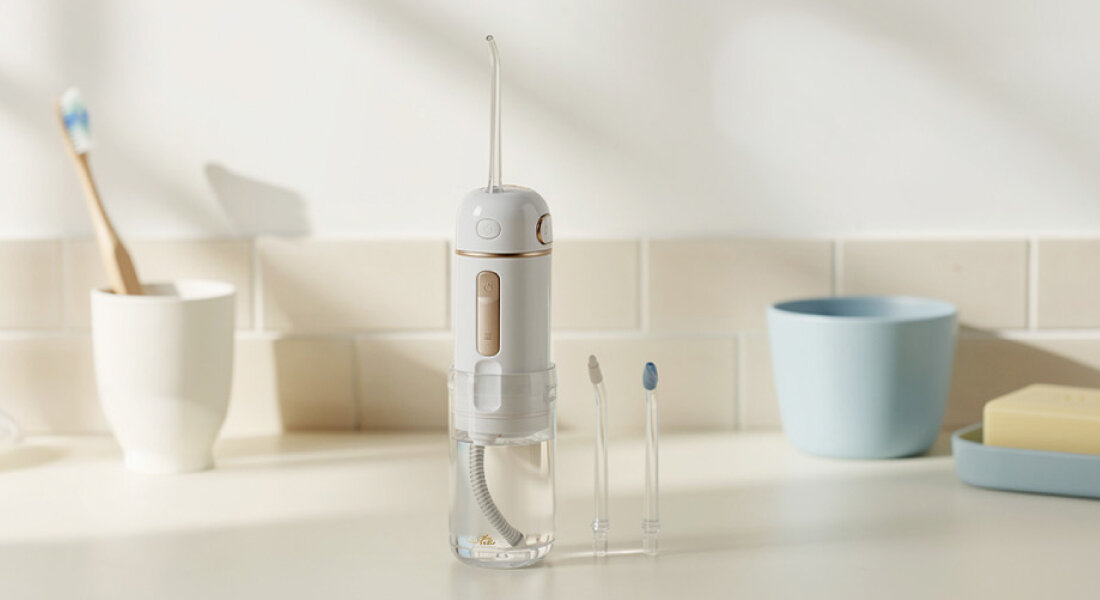 Irygator ETA Aqua Care Compact ETA570890000 Biały zdjęcie lifestyle 4 tryby pracy 4 tryby czyszczenia dostosowanie intensywność
