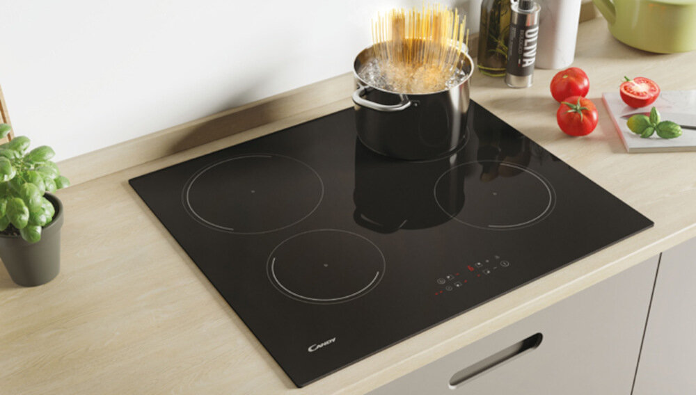 Plyta indukcyjna CANDY CI642C E14U Funkcja zabezpieczenie przed zalaniem