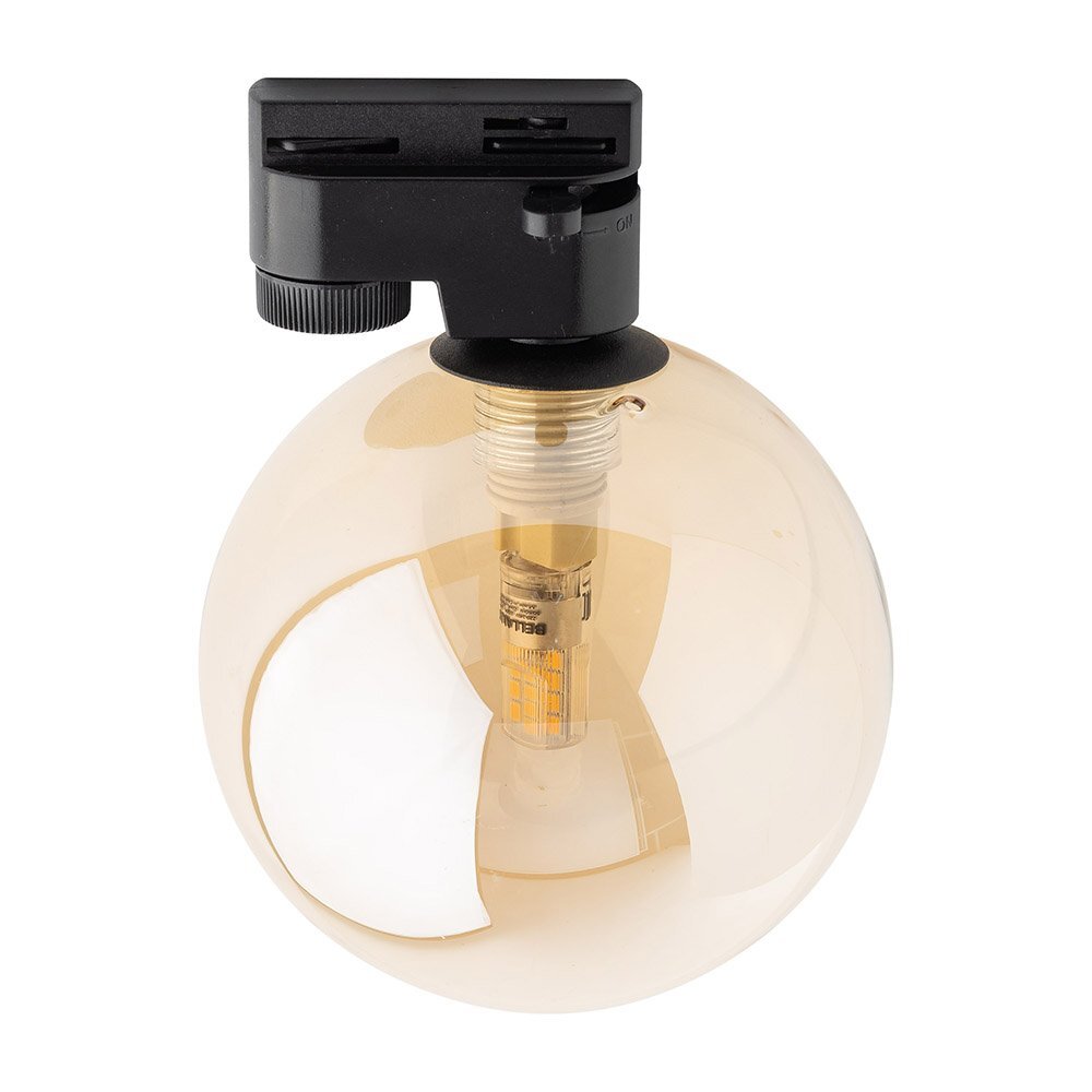 Lampa szynowa z czarną podstawą i bursztynowym kloszem w kształcie kuli. Wewnątrz klosza widoczna jest żarówka z oznaczeniem \'BELLA\'.