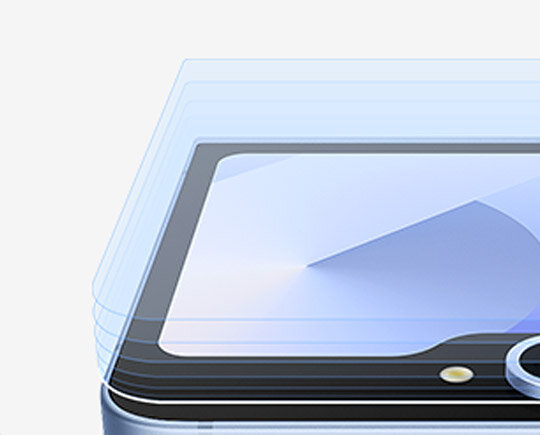 Obraz przedstawia zbliżenie na górną część smartfona z widocznym ekranem i zaokrąglonymi krawędziami. Na ekranie widać subtelne gradienty kolorów, a obudowa ma metaliczny wygląd.