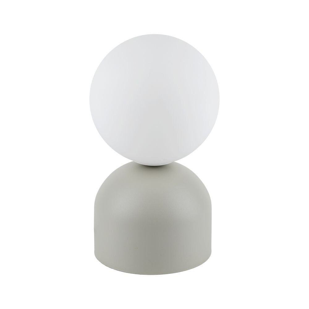Na obrazie widoczna jest lampa stołowa z białym, kulistym kloszem i beżową podstawą w kształcie półkuli. Lampa ma nowoczesny design i jest przeznaczona do pokoju dziecięcego.