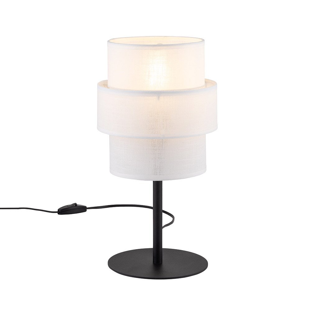Lampa stołowa z białym, cylindrycznym abażurem składającym się z trzech warstw, umieszczona na czarnym, metalowym stojaku z okrągłą podstawą. Lampa posiada czarny przewód z włącznikiem.