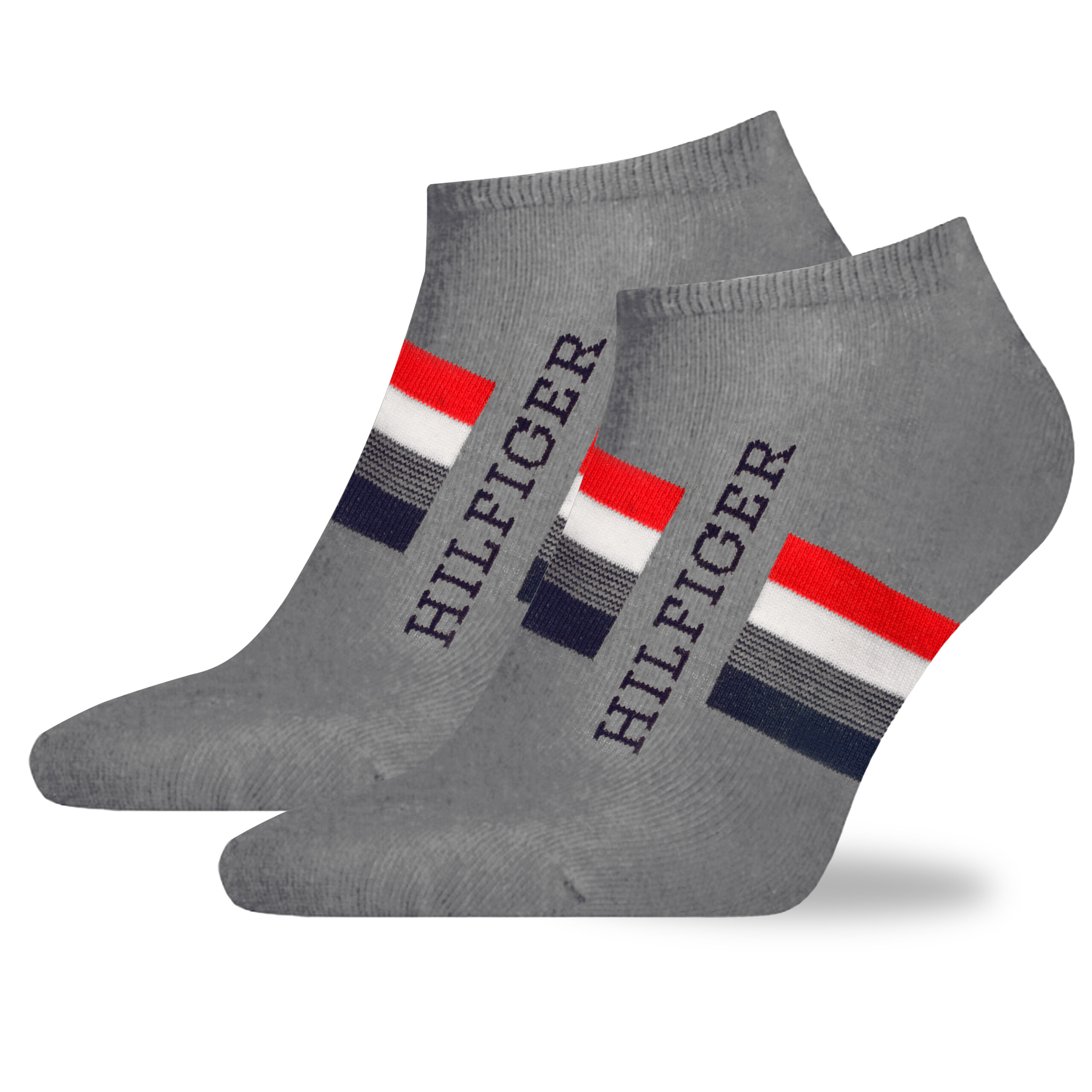Dwie szare skarpety z napisem \'HILFIGER\' oraz kolorowymi paskami w kolorach czerwonym, białym i granatowym.