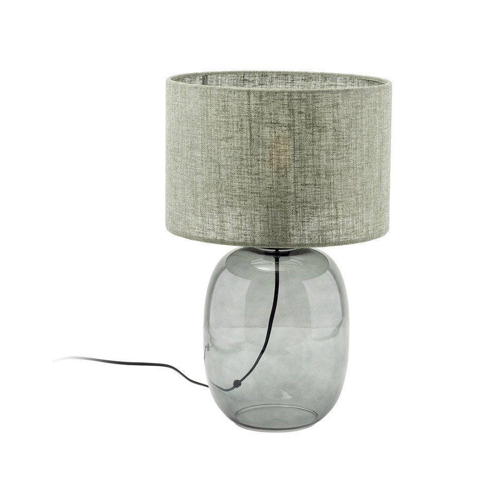 Lampa stołowa z przezroczystą, szklaną podstawą i grafitowo-zielonym abażurem. Kabel zasilający jest widoczny wewnątrz podstawy.