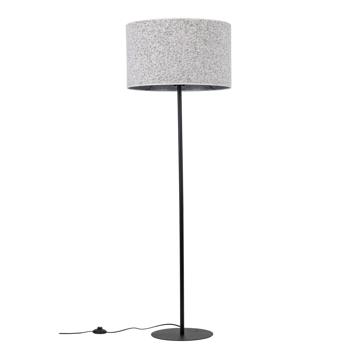 Lampa podłogowa z czarną podstawą i cylindrycznym kloszem w jasnym kolorze. Posiada włącznik nożny na przewodzie zasilającym.