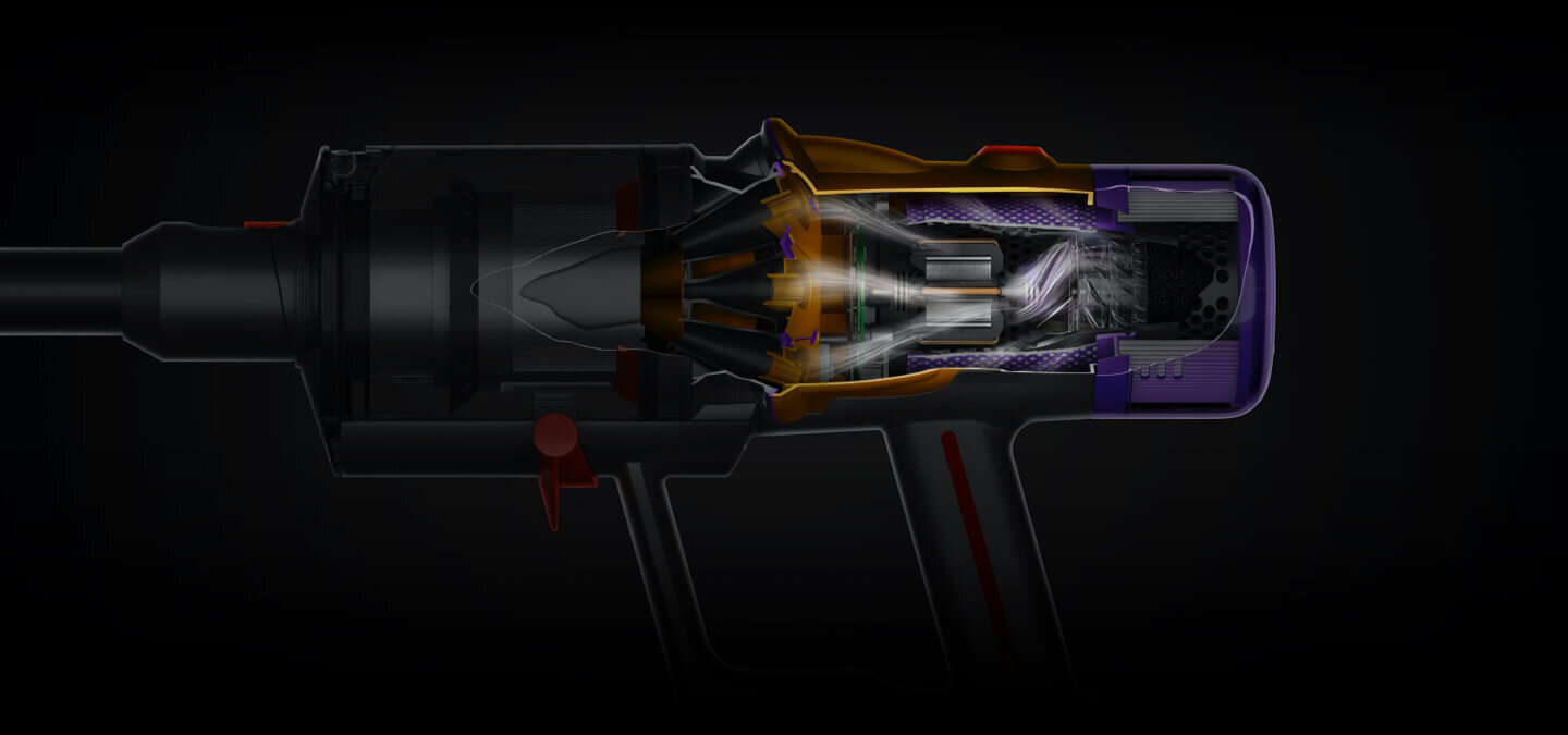 Przekrój odkurzacza pokazujący wewnętrzne komponenty, takie jak silnik i filtry, w ciemnym otoczeniu.