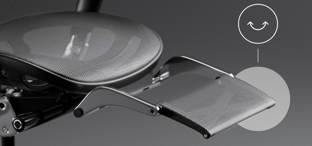 Fotel DIABLO CHAIRS V-Master Czarno-szary prezentacja wysuwanego podnóżka na szarym tle chowany podnóżek relaks odpoczynek ergonomia komfort