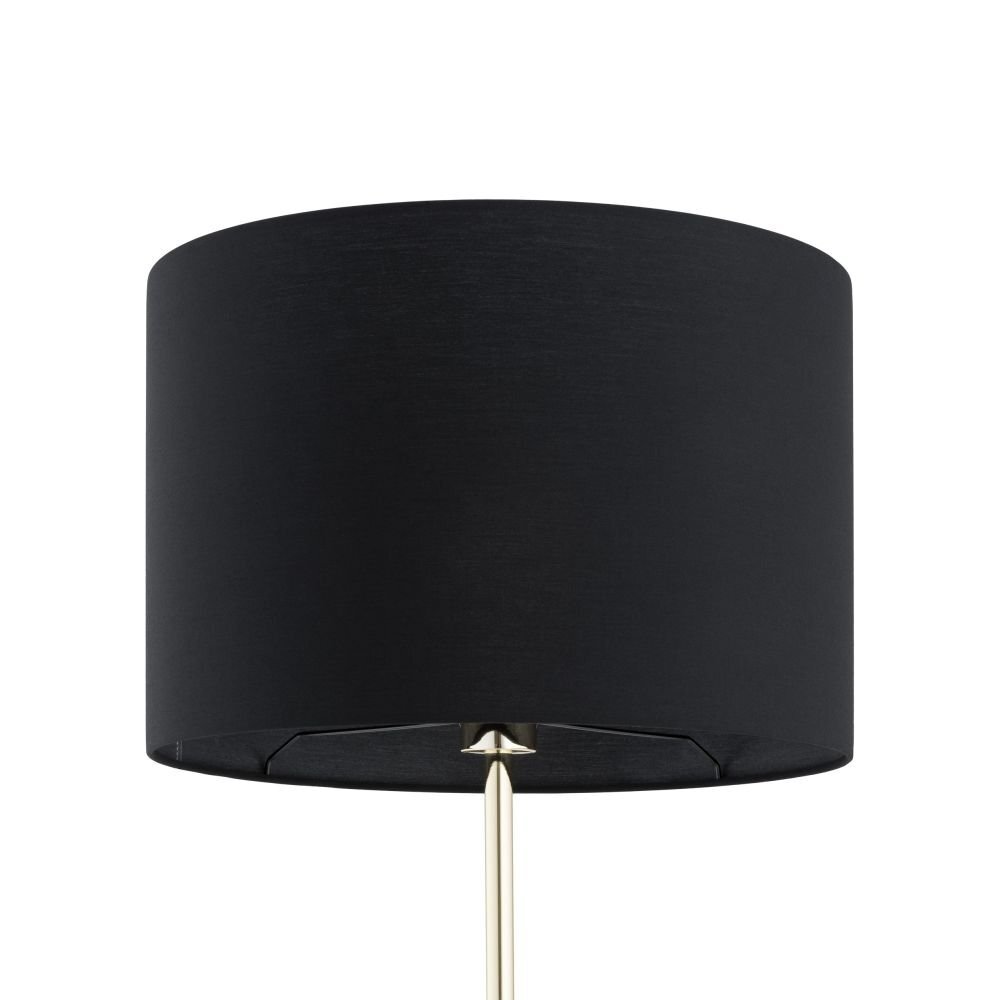 Czarna lampa podłogowa z cylindrycznym abażurem i złotym trzonkiem. Lampa ma nowoczesny design.