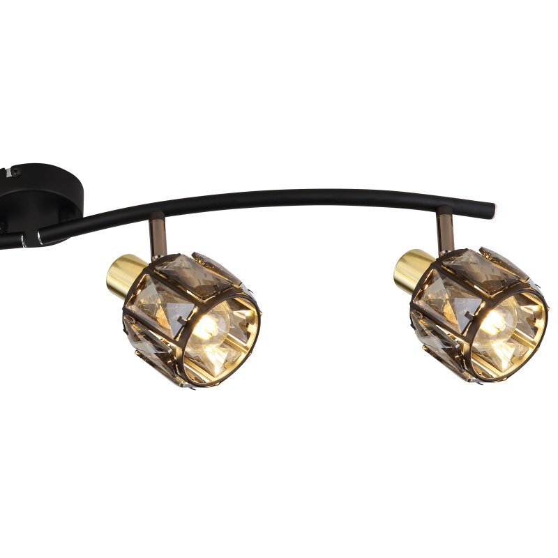 Lampa sufitowa z dwoma reflektorami w kolorze czarnego matu i złota, ozdobiona przydymionymi kryształami. Reflektory są zamontowane na zakrzywionej listwie.