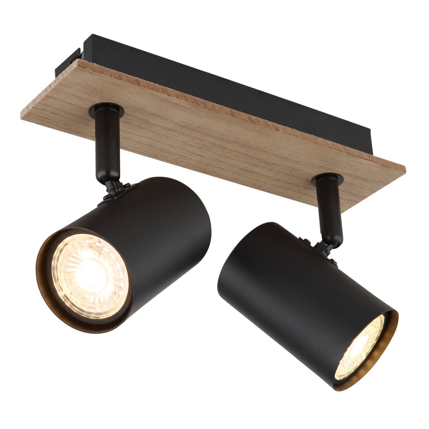 Na obrazie widoczna jest lampa reflektorowa z dwoma czarnymi, cylindrycznymi kloszami zamontowanymi na prostokątnej, drewnianej podstawie. Klosze emitują ciepłe światło.