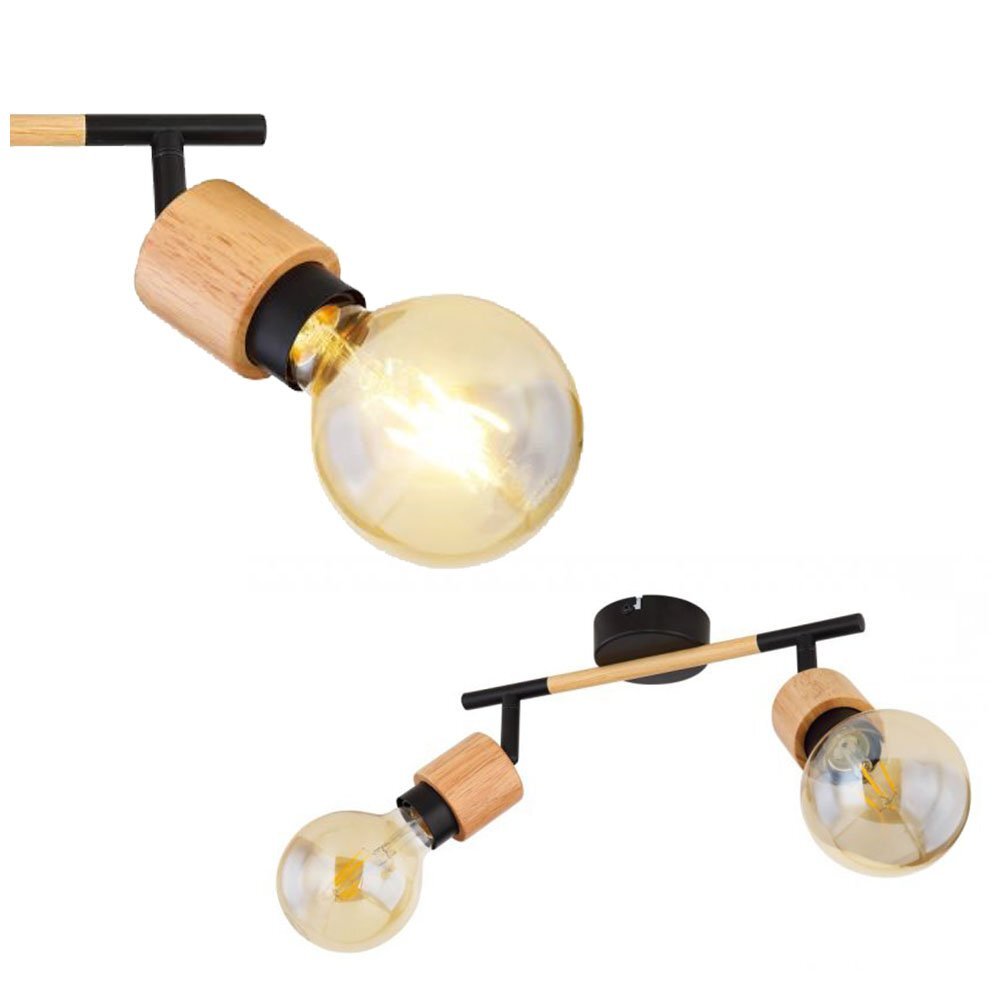 Lampa ścienna z dwoma żarówkami w przezroczystych kloszach, zamontowana na czarnym matowym uchwycie z elementami drewnianymi. Reflektory są regulowane, a całość ma nowoczesny design.